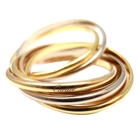 tricolor ring cartier|cartier 7 band rolling ring.